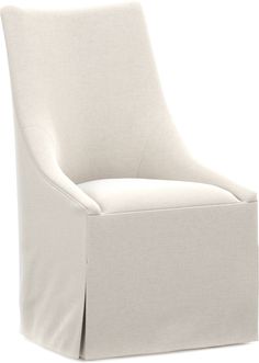 an upholstered chair with a white cover on the seat and backrests