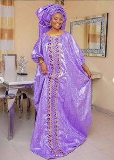 Description: This magnificent custom African dress is perfect for any occasion you want to look your best. Important Note: For broderie mix with bazin and garniture mix clothes only: Depending on the availability of the( fabric) / Garnitures (TRIMS) may be different than the one in the pictured. Gold Long Sleeve Fancy Dress, Gold Long Sleeve Dress For Fancy Occasion, Purple Fitted Dress For Celebration, Fitted Purple Dress For Celebration, Embroidered Dress For Fancy Occasions, Mali Fashion, Gold African Dress, Brocade Embroidery, Afrikaanse Mode