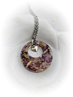 "Funeral Flower Necklace - Custom Memorial Bead Necklace - Resin Jewelry - Flower Keepsake - Preserved Flower Jewelry - Flower Petal Necklace This 1\" pendant necklace can be made with any flowers that that you want to preserve. These can be flowers from a loved one's funeral, your wedding bouquet, or any other memorable event. You will need to send me at least a 1\" x 1\" piece of flower petals. Please contact me after you've ordered for mailing instructions. *The backs of these necklaces are n Handmade Round Flower Necklace For Weddings, Purple Flower Necklace For Wedding, Purple Wedding Jewelry With Flower Decoration, Memorial Beads, Custom Memorial, Memorial Jewelry, How To Preserve Flowers, Flower Bouquet Wedding, Flower Necklace