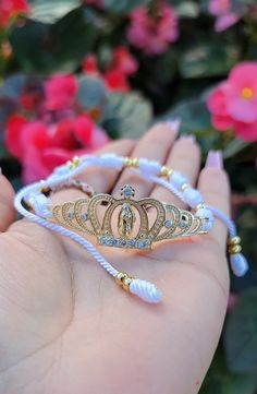 Two color options Adjustable to fit any size wrist 14k gold plated Virgin Mary center