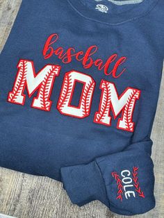 a baseball mom shirt with the word, baseball mom on it