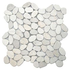 white pebbles are arranged on top of each other