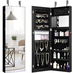 the inside of a black jewelry cabinet