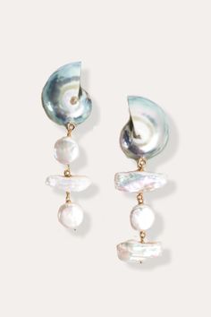 Introducing the Nautilus Shell and Freshwater Pearl Earrings, a beautiful mix of ocean charm and timeless style. These earrings feature nautilus shells, each showing off nature's spiral design and unique patterns. Paired with shiny freshwater pearls, they create a lovely balance of natural beauty and elegance. Handcrafted with care, each earring highlights the simple beauty of the  Perfect for adding a touch of class to any outfit, these earrings celebrate the wonders of the sea. Enhance your je Elegant Mother Of Pearl Shell Earrings, Ocean-inspired Pearl Drop Earrings, Nautilus Earrings, Ocean-inspired Shell-shaped Mother Of Pearl Jewelry, Ocean-inspired Shell-shaped Pearl Earrings, Ocean-inspired Shell Drop Earrings, Chunky Gold Jewelry, Nautilus Shell, June Birthstone Jewelry