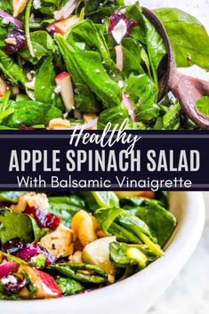 healthy spinach salad with balsamic vinaigrete in a white bowl