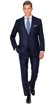 Our model is 6'1'' and wears a 40R jacket (waist taken in an additional 2'') and a size 30W pant. If you need any alterations, we'll cover up to $50 per suit - just email us the receipt from your local tailor.
The Solid Deep Blue Suit boasts a classy shade of blue that is rich & saturated, yet sufficiently conservative for just about any occasion. The Super 100s wool fabric, woven by Angelico in Italy delivers every quality a reliable everyday suit should possess - great drape, comfort and durab Deep Blue Suit, Navy Blue Suit Men, Sophisticated Men, Mens Office Wear, Dark Blue Suit, Dapper Mens Fashion, Black Outfit Men, Blue Suit Men, Blue Suit Wedding