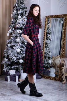 - Soft plaid fabric- Midi length (115 cm or 45 in), custom length available- Round back with zipper- 3/4 sleeves (17 in or 40 cm)- Side seam poskets- Flared skirt- NOTE! Belt isn't includedCan be made in plus sizes, junior bridesmaids and in maternity style. If measurements don`t match any size in my chart, I highly recommend a custom fit. Visit my FAQ section for required measurements.5 unique colors for your choice (are given on photo) or you can request a custom color. To see colors in person Fall Plaid Dress With Short Sleeves, Plaid Midi Length Dress For Work, Workwear Midi Length Plaid Dress, Red Tartan Skirt, Black Plaid Dress, Red Long Skirt, Long Plaid Skirt, Green Plaid Dress, Navy Blue Bridesmaids