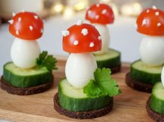 cucumber slices with mushrooms and cheese on them