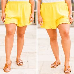 The shorts have us in a daze! The bold yellow color is so gorgeous and the crepe textured fabric is to die for! These have an elastic waist to keep you in comfort and a totally sweet ruffle hem! The pockets on the front are super convenient so just throw these on with your fave top and some super cute sandals for the perfect warm weather look! 100% Viscose Yellow Vacation Shorts With Elastic Waistband, High-waisted Yellow Shorts For Beach, Yellow Ruffled Beach Bottoms, Summer Ruffle Shorts For Beach Season, Summer Ruffled Shorts For Beach Season, Yellow Ruffled Bottoms For Day Out, Yellow Summer Shorts With Elastic Waistband, Yellow Ruffled Bottoms For Vacation, Beach Season Ruffled Shorts