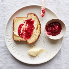 a piece of bread with butter and jam on it