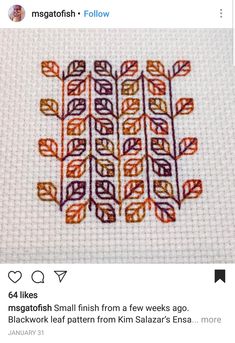 a cross stitch pattern on the back of a tweep with an orange and purple design