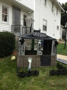 a fake hand is sticking out of the back of a house