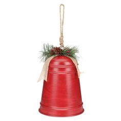 a red bell hanging from a rope with pine cones on it's top and evergreen sprigs in the bottom