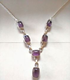 Exclusive Amethyst necklace handmade by artisans from India. Exquisite Amethyst set in sterling silver connected with a sterling silver rolo chains.length 20 inches adjustable to 18 inches.weight 9.8 grams Purple Sterling Silver Jewelry With Adjustable Chain, Silver Amethyst Necklace With Cabochon, Silver Amethyst Cabochon Necklace, Purple Sterling Silver Necklace With Adjustable Chain, Silver Amethyst Necklace With Adjustable Chain, Amethyst Set, Amethyst Necklace, Necklace Sterling Silver, Necklace Handmade