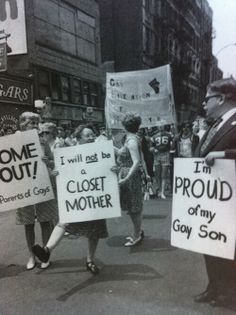 some people are holding signs in the street