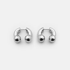 A unique twist on the classic horseshoe design, this barbell earring is both tough and stylish, serving at all angles. Horseshoe Design, Horseshoe Earrings, Barbell Earrings, Unique Accessories, Timor Leste, Sleek Look, Guinea Bissau, Accessories Unique, Twist