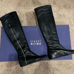 Black Butter Soft Napa Leather Over The Knee Boots. An Exposed Three-Quarter Zip Details The Side Of A Rich Black Leather Boot Fashioned With A Hidden Wedge Heel For A Clever Lift. Features An Exposed Zip At The Outer Side And An Elastic Inset Behind The Knee. 1.25" Hidden Wedge Heel. Signature Rubber Sole. Made In Spain. These Have Been Pre-Loved With Signs Of Wear On Leather Particularly In The Toe, Heel And Soles But Still Have Lots Of Life. Please Note: These Are A 7n, Narrow And Are Very Slim Fit On The Leg. Leather Over The Knee Boots, Otk Boots, Leather Boot, Black Leather Boots, Over The Knee Boots, Over The Knee, Stuart Weitzman, Wedge Heels, Fashion Boots