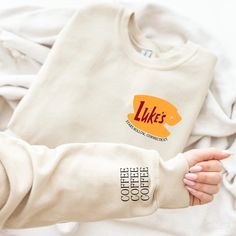 Our sweatshirts are super soft and are made with 50% cotton 50% polyester. Color customizable. Sizing is unisex. Luke’s Diner Sweatshirt, Gilmore Girls Clothes, Gilmore Girls Merch, Gilmore Girls Hoodie, Cricut Sweatshirt Ideas, Gilmore Girls Tattoo, Sweatshirt And Shirt Outfit, Gilmore Girls Shirt, Outfit Ideas Shirt