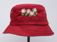 Item: flower embroidered bucket hat Material: polyester Size: one size fits most, brim measuring 2 inches long Embroidery: hand made with acrylic thread Free first class shipping, upgradable priority mail service. 30 days return policy, feel confident at your purchase! Red Cotton Bucket Hat For Spring, Red Cotton Sun Hat For Spring, Summer Cotton Embroidered Hats, Casual Cotton Sun Hat With Embroidery, Handmade Cotton Hats For Outdoor, Handmade Cotton Outdoor Hats, Handmade Cotton Sun Hat Cap, Summer Cotton Hat With Embroidery, Casual Embroidered Bucket Hat For Beach