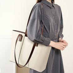 Gender: Women Type: Tote Bag Features: Adjustable Strap, Inner Pockets Main Materials: Cowhide Lining: Polyester Type of Closure: Zipper Style: Casual, Daily, Stylish Size: Length: 40 cm / 15.75 " Width: 28 cm / 11.02 " Height: 12 cm / 4.72 " Large Beige Shoulder Bag For Shopping, Large Beige Satchel Shoulder Bag, Large Rectangular Leather Bag, Elegant Long Handle Bags For Daily Use, Large Size Beige Bags, Large Size Beige Shoulder Bag, Large Rectangular Leather Shoulder Bag, Elegant Shoulder Bag With Long Handle For Daily Use, Beige Faux Leather Shoulder Bag For Office