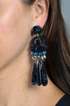 Featuring tortoise resin, velvet, and beads, these earrings are not for wallflowers. Our head-turning Lavish Velvet Earring adds elegance and glamour to event-ready ensembles. Materials: Resin, Glass Beads, Brass Size: 4" x 1.5" Stud Backing Imported Elegant Blue Resin Earrings, Chic Resin Jewelry For Party, Crystal Dangle Earrings, Midnight Blue, Tortoise, Ear Cuff, Glass Beads, Dangle Earrings, Size 4