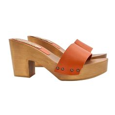 Brown wooden base clogs Orange leather band Heel height 9 cm and plateau 3 cm Stable and comfortable made entirely in ITALY. Craftsmanship. BEFORE COMPLETING YOUR PURCHASE DO NOT FORGET TO CHECK THE SIZE! Length along the curve: 37 EU = 6 US = UK 5 = 24.50 CM + WIDTH 8 CM 38 EU = 7 US = UK5.5 = 25.00 CM + WIDTH 8 CM 39 EU = 8 US = UK 6 = 26.00 CM + WIDTH 8 CM 40 EU = 9 US = UK6.5 = 26.50 CM + WIDTH 8.5 CM 41 EU = 10US = UK7.5 = 27.00 CM + WIDTH 9 CM 42 EU = 11US = UK 8 = 28.00 CM + WIDTH 9 CM 43 Orange Mules With Removable Insole And Round Toe, Orange Open Heel Mules For Spring, Orange Leather Round Toe Clogs, Orange Leather Clogs, Orange Closed Toe Leather Clogs, Orange Leather Closed Toe Clogs, Orange High Heel Leather Mules, Orange Sandals With Stacked Heel And Round Toe, Orange Round Toe Sandals With Stacked Heel