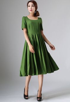 "This Prairie Linen dress is designed with soft linen in forest green hues, perfect with Puff sleeve, round neckline, and back button closure, This womens swing dresses can be styled with light weight a accessories for a daring ensemble . vintage inspired design, Handmade by Xiaolizi. DETAILS 50% linen, 50% Cotton, Medium weight Linen No lining Square neckline Short Puff Sleeve Seam pockets Back Zipper Below Knee length Spring, Summer House dress More color and More size https://etsy.me/2TGUAgq Casual A-line Dress With Pleated Bodice, Green Fitted A-line Pleated Dress, Green Pleated A-line Maxi Dress, Dark Green Knee-length Summer Dress, Flowy Green Midi Dress Solid Color, Dark Green Knee-length Midi Dress For Summer, Green Midi Dress With Pleated Bodice, Fitted Green Dress With Pleated Waist, Flowy Knee-length Dress With Pleated Hem