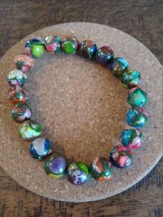 Full of color and fun.  This listing is for a multi colored bracelet. Casual wear. #64 Cheap Multicolor Faceted Beaded Bracelets, Denver Co, Colorful Bracelets, Multi Colored, Denver, Casual Wear, Jewelry Bracelets, Beaded Bracelets, Accessory Gift