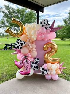 balloons and decorations are arranged in the shape of numbers