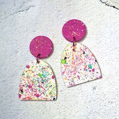 Earrings/Stud Dangle - #798 Lightweight - 4.1g each Unique, Handmade 4.75cm long - measured from piercing 3cm wide Titanium Posts - Loved by the most sensitive ears Beautiful white & magenta, lightly textured polymer clay stud earrings Front is sprinkled with all the colours of the rainbow and has a lightly textured, matte finish Back is the same colour as the front but without sprinkles and has a lightly textured, matte finish Colours may vary slightly depending on device used Titanium Posts and Comfort Backs Earrings can be changed to hooks if so desired at no extra cost.  There are many co-ordinating colours to choose from.  Hooks in anodised aluminium and niobium.    Contact me when purchasing with your choice of type and colour Earrings arrive gift boxed ready for giving or a beautifu Magenta Earrings, Hot Pink Earrings, Earrings White, Earrings Stud, White Earrings, Pink Earrings, Sensitive Ears, Clay Art, Clay Earrings