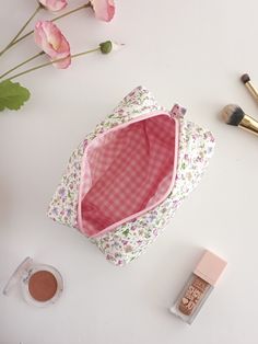 "This cute and floral makeup bag will help you in many ways. You can put your makeup in this toiletry bag when you are at a party or out. You can make a loved one happy by gifting it to a friend. If you are going to travel, you can put your cosmetic bag in your suitcase and prevent your make-up materials from being messy.You can use it as a pencil case when going to school.🌸 🧺Materials: Cotton fabric is used in the outer and inner fabric. There is a fiber fabric between the two, so we have a f Pink Cosmetic Storage With Removable Pouch, Pink Zipper Pouch For Cosmetics And Toiletries Gift, Pink Cosmetic Storage Zipper Pouch As Gift, Pink Cosmetic And Toiletry Storage Zipper Pouch As Gift, Pink Gift Cosmetic And Toiletry Storage With Zipper, Everyday Pink Zipper Pouch For Cosmetics And Toiletries, Everyday Pink Cosmetic Zipper Pouch, Handmade Makeup Bag, Floral Makeup Bag