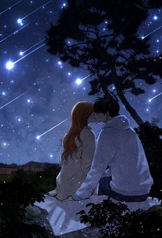 a man and woman kissing under the stars