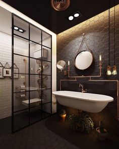 a bathroom with a tub, sink and mirror in it's center wall is lit by recessed lights