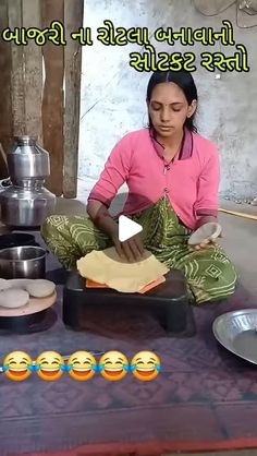 a woman sitting on the floor in front of some bowls and pans with food