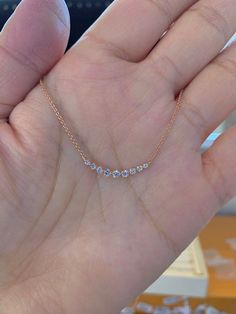 "This stylish and chic Floating diamond bar necklace is great for your everyday wear. The natural diamonds are all white and super sparkly. Excellent craftsmanship on this necklace, will lay nicely on the neck, won't flip around. The chain length can be adjustable from 18\" to 17\" or to 16\" with extra loops. Perfect necklace to wear by itself or layer with other necklaces. The chain is smooth and strong. Genuine round brilliant cut diamonds total weight: 0.42 Carats Clarity: SI1 Color: F 18K Y Diamond Necklace Chain, Fine Jewelry Diamond Bar Necklace, Anniversary Diamond Necklace With Clavicle Chain, Rose Gold Diamond Necklace With Moissanite And Diamond Accents, Dazzling Diamond Clavicle Necklace, Diamond Bar Necklace With Diamond Accents As Gift, Diamond Bar Necklace Fine Jewelry Gift, Fine Jewelry Diamond Bar Necklace As Gift, Diamond Bar Necklace Gift Fine Jewelry