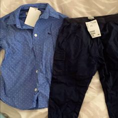 A Button-Down Shirt, Blue With White Dots, And Navy Jersey-Lined Pants. Top Is 2-3 Y And Bottom Is 1.5-2y Because H&M Pants Run Long! New With Tags. Casual Blue Sets With Pockets, Casual Playwear Sets With Pockets, Casual Navy Sets For Spring, Casual Playtime Sets With Pockets, Casual Blue Buttoned Sets, Casual Blue Sets With Buttons, Casual Playtime Sets With Buttons, Casual Navy Playwear Sets, Navy Casual Playwear Sets