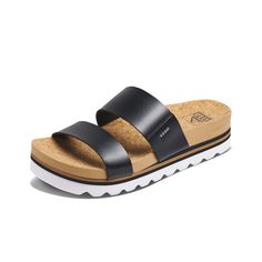 PRICES MAY VARY. Upper | Super soft unlined PVC Free vegan leather two strap slide Footbed | Our most comfortable footbed featuring the perfect blend of cushion and rebound support. This is a wider shape with generous arch support and heel cupping Outsole | Lightweight and durable chunky lug EVA outsole with a 1.75” platform silhouette Sustainability | Some colorways include 100% natural Cork footbed cover Reef Sandals, Reef Shoes, Women In Black, Fashion Runway, Womens Slides, Sandals For Women, Leather Slides, Arch Support, Slide Sandals