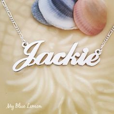 Order any word or name, for your new Sterling Silver 925 Jackie style name necklace!A great gift for any occasion!*Nameplate and chain are all solid sterling silver 925.*Larger nameplate is 1.4 cm tall (0.6 inches)*Nameplate is 1.2 mm thick.*This listing is for one (1) name with one (1) capital letter.*Choose your chain length and style from the menus above!*Be sure to tell me the name or word that you would like in the NOTE TO SELLER section of your etsy checkout!If you liked this item you can Silver Nameplate Custom Necklace, Custom Silver Nameplate Necklace, Sterling Silver Initials Name Necklace For Birthday, Sterling Silver Initials Necklace For Birthday, Customized White Sterling Silver Name Necklace, Silver Letter Name Necklaces, Silver Custom Name Necklace With Initial Pendant, Silver Custom Name Initial Pendant Necklace, Customizable Silver Nameplate Necklace