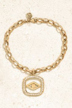 Sydney Evan's bracelet has a dangling Evil Eye charm framed by a dusting of diamonds, totaling 0.52-carats. It's made from polished 14-karat gold and has oval-shaped chain links. Stack yours alongside chunkier bangles or a masculine watch. White Gold Diamond Bracelet, Tarnish Resistant, Timeless Diamond Bracelet, Tarnish Resistant, Timeless Tarnish-resistant Diamond Bracelet, Luxury 14k Gold Chain Bracelet With Diamond Accents, Luxury Cubic Zirconia Jewelry With Charms, Tarnish Resistant Diamond Bracelet, Luxury Gold-plated Charm Bracelet With 17 Jewels, Luxury Gold Plated Charm Bracelet With 17 Jewels, Luxury Gold-tone Jewelry With Diamond Accents