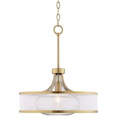 an image of a chandelier with white shades on the bottom and gold trimmings