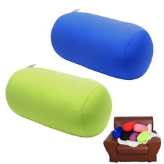 two blue and green pillows sitting next to each other on top of a brown chair