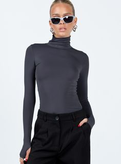 Long sleeve top  Slim fitting   Princess Polly Lower Impact   86% reclaimed nylon 14% elastane   Kiana is wearing a size US 2 / AU 6    Rolled turtleneck   Good Stretch  Unlined Festival Tops Women, Womens Knit Tops, Coachella Outfit, Festival Tops, Sweatshirt Set, Bralette Tops, Long Sleeve Turtleneck, Turtle Neck Top, Outerwear Outfit