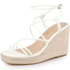 This beautiful espadrille sandal has strappy contoured cushioning and a supportive wedge heel give a long-lasting comfort. Flexible adjustment of the length of the rope to replace the unique design of the ankle strap. Strappy Lace up Sandals; Espadrille Design; Wedge Heels; Low Platform; Open Toe; Vamp: Faux Leather; Outsole: TPR; Heel: Espadrille+EVA; Heel Height: 3 8/9 inches; Platform Height: 1 inches. High Heel Synthetic Espadrilles For Spring, Synthetic High Heel Espadrilles For Spring, Summer Espadrille Heels With Cushioned Footbed, Beach Season Espadrille High Heel, Adjustable High Heel Synthetic Wedge Sandals, Adjustable High Heel Wedge Sandals In Synthetic Material, White Espadrille Heels For Summer, Strappy Synthetic Wedge Sandals For Vacation, Spring Straw Wedge Sandals With Cushioned Footbed