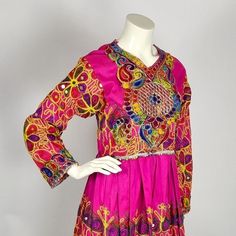 Handmade vintage Sindhi dress, richly decorated with traditional colorful embroidery in floral patterns. Sindhi people are an ancient Indus civilization, living nowadays mostly in the Pakistani Sindh province and in India, still conserving many ancient traditions and the Sindh language . Sindhi people are famous for their exquisite cuisine, for their colorful attire and their friendly nature. The dress is traditionally made of mixed materials, which were available at the time of making the dress Indus Civilization, Sindhi Dress, Colorful Embroidery, Dress Vintage, Floral Patterns, Dress Clothes For Women, Netherlands, Vintage Dresses, The Dress