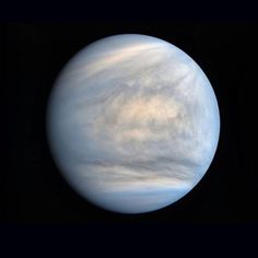 an image of the planet with clouds on it's surface and dark sky in the background