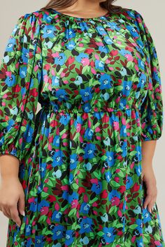 Move with confidence in the Destine Floral Carmine Midi Dress! Sleek woven satin, with a gorgeous multi-color floral design, sweeps from a pleated round neck with a high waist belt around the waist area. Its long puff sleeves with a bottom ruffle hem, give it that flowy look. Pair this dress with your favorite mules or flats for a stylish outfit. - Crew neckline- Adjustable waist- Lined- Keyhole- Color: Green Blue FuchsiaSize + Fit - Model is 5'9" and wearing size 2X- Measurements taken from siz Green Floral Print Satin Dress, Green Satin Dress With Floral Print, Green Satin Dress For Spring, Green Silk Midi Dress For Garden Party, Green Satin Dress For Garden Party, Stylish Outfit, Long Puff Sleeves, My Dress, Ruffle Hem