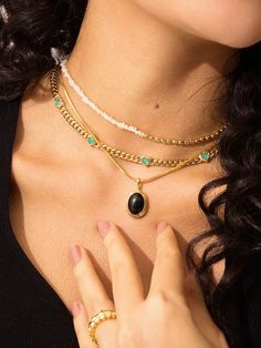 This beautiful Black Onyx pendant offers a sophisticated look that pairs perfectly with any outfit. Its natural gemstone creates a stunning statement piece that glimmers with sophistication. Details Recycled Silver: 18ct gold vermeil Gemstone: Black Onyx (Birthstone July) Total height: 26.2mm ( 18.6mm without bail) Width: 15mm Elegant Oval Cabochon Jewelry With Natural Stones, Black Jewelry With Gemstone Accents For Gift, Elegant Jewelry With Oval Natural Stones, Elegant Onyx Stone Jewelry, Black Jewelry With Oval Beads As A Gift, Black Oval Beaded Jewelry As Gift, Elegant Oval Beads Necklace With Stones, Black Stone Pendant Jewelry, Black Oval Beaded Jewelry Gift