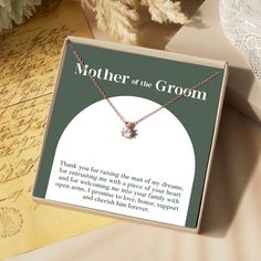 a mother of the groom necklace in a gift box