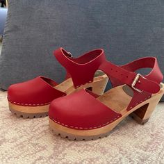 Mia Abba Clogs. New Without Tags, Never Worn. Size 36 (Us 6). Made In Sweden. Beautiful Red Leather Upper, Wood Footbed/Heel. Red Heels Clogs & Mules, Casual Red Closed Toe Clogs, Red High Heel Mules With Wooden Heel, Red Summer Clogs With Wooden Heel, Red Clogs With Wooden Heel For Summer, Red Open Toe Clogs With Wooden Heel, Casual Red Heels With Wooden Heel, Red Clogs With Removable Insole And Round Toe, Red Sandals With Wooden Block Heel