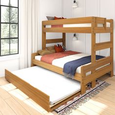 there is a bunk bed with two sets of mattresses on the bottom and top